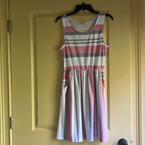 Paposon brand dress. Pink, white and gray stripes with pockets size medium.